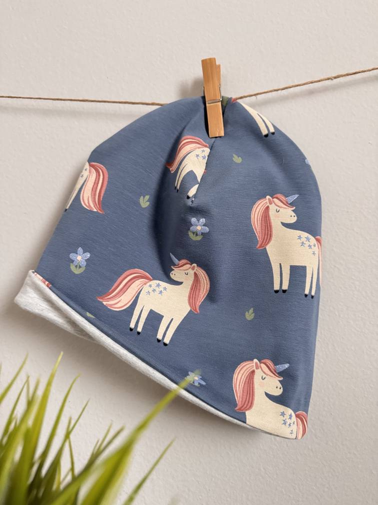 Baggy bučka "Samorogi", modra osnova